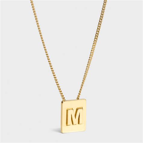 celine m necklace gold tone.